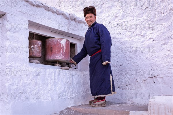 Elderly man in traditional Ladakhi clothes