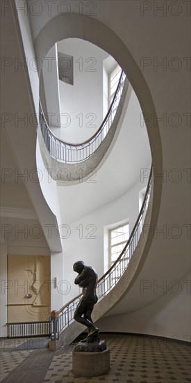 Foyer with free-swinging Art Nouveau staircase and Auguste Rodin's Eva