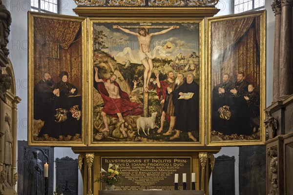 Interior view with altarpiece by Cranach