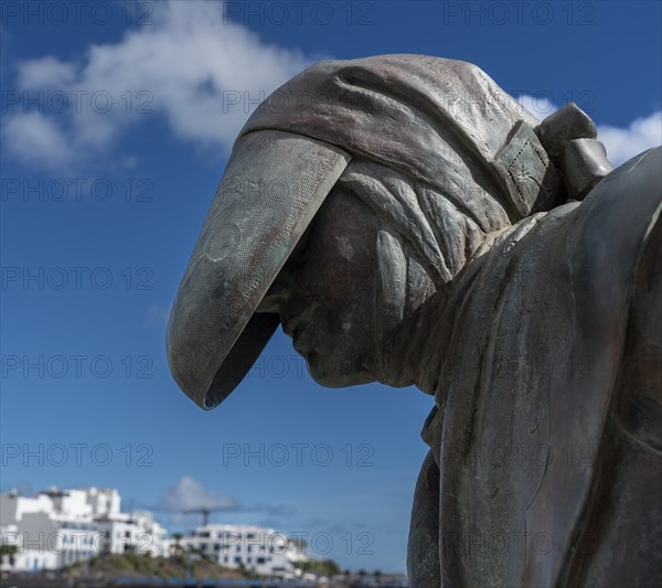 Book statue at the lagoon Charco de San Gines