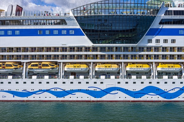 The cruise ship AIDAmar at the quay wall of the Warnemuende Cruise Center in the port of Rostock-Warnemuende