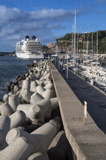 Coastal wall at the marina with tetrapods for protection