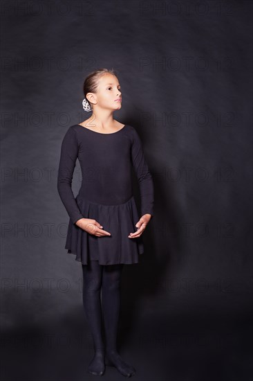 Young ballet dancer in basic position