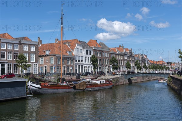 Townscape with traditional flat-bottomed sailing boat at Bierkaai