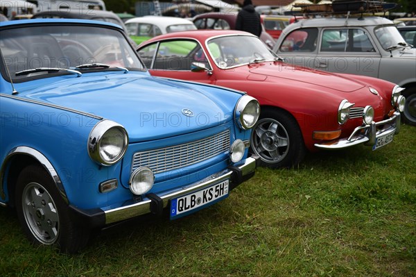 Vintage Trabant 601 and VW Karmann-Ghia type 14 at a classic car meeting in Benneckenstein