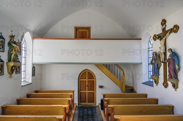 Gallery with crucifix and St. Florian