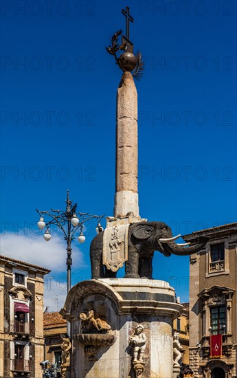 Fountain with Roman elephant statue made of basalt and current landmark of the city in Piazza Duomo