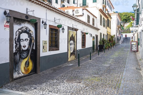 Alley with colourfully painted doors