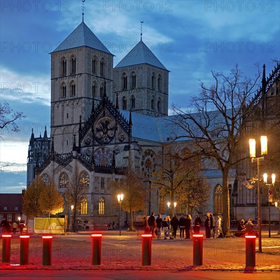 Red luminous bollards on the Domplatz with St. Pauls Cathedral