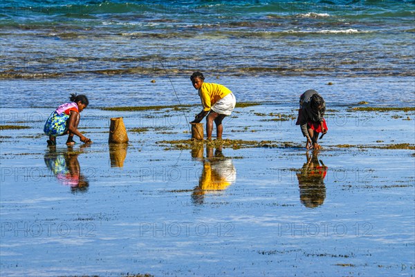 Locals fishing in the waters of the Island Ile Sainte Marie