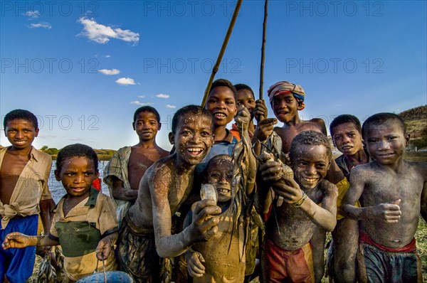 Young boys with their fresh caught fish