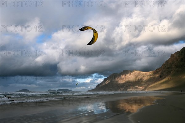 Kitesurfers on the beach of Caleta de Famara