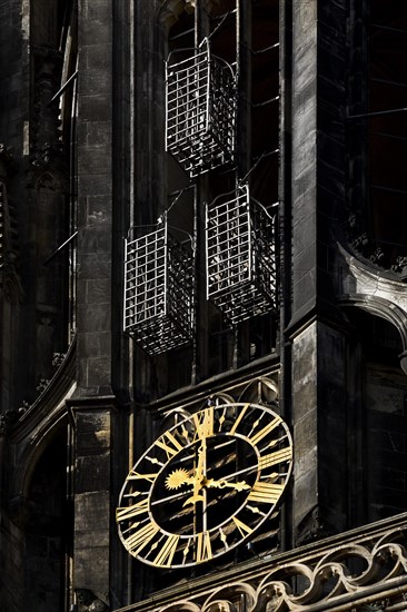 The original baskets on the tower of the Sankt Lamberti Church with the church tower clock