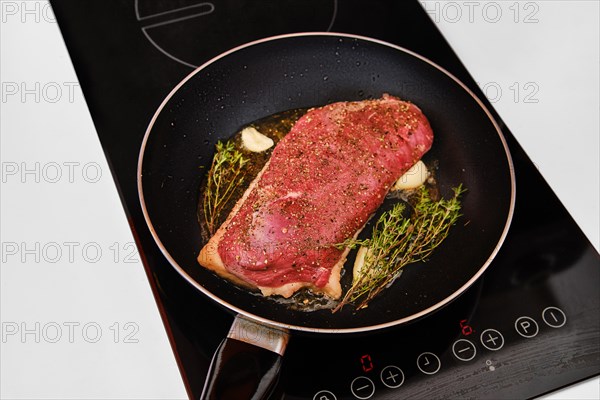 Cooking duck breast in a frying pan