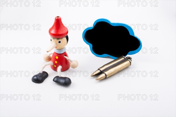 Pinochio toy figurine thinking of killing someone on display