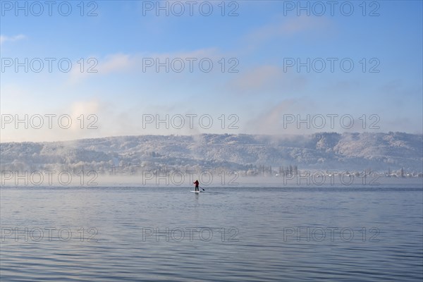 Stand-up paddler on Lake Constance