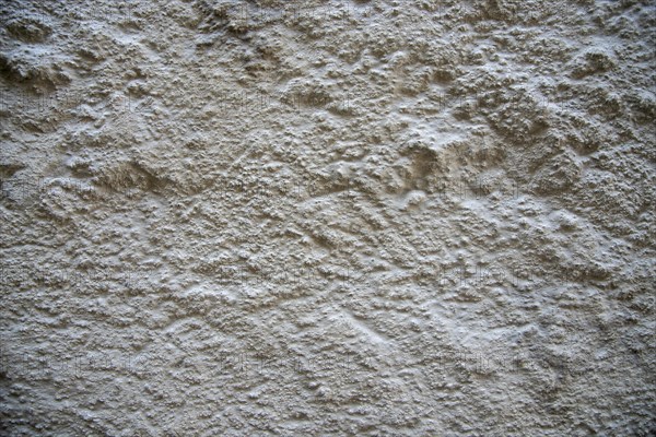 Rough plaster facade as texture or background