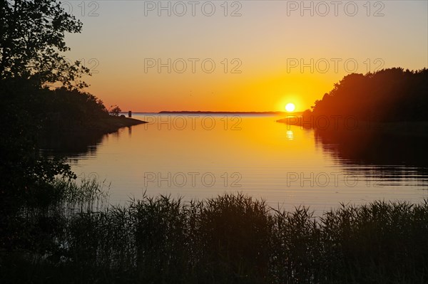 Setting sun over a small bay