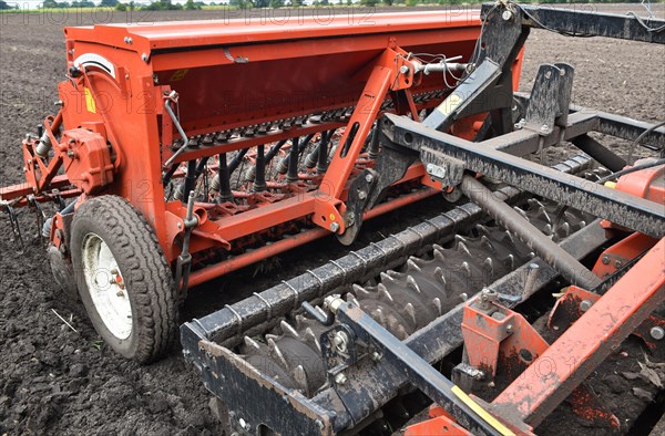 Harrow and seed drill on a tractor