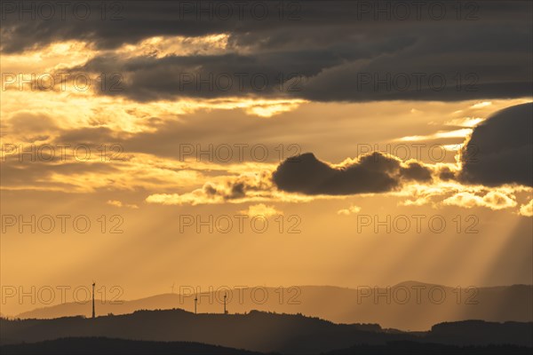 Wind turbines on the mountains of the Black Forest at dawn. Freiburg brisgau