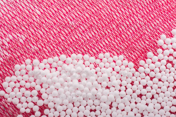 White little polystyrene foam balls as background