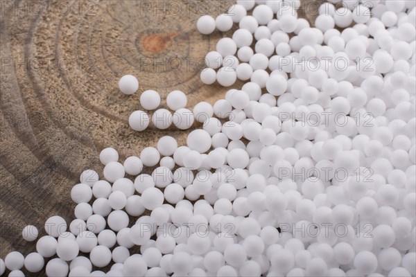 White little polystyrene foam balls as background