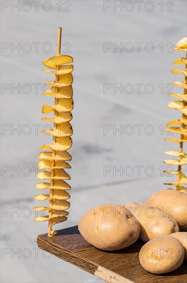 Peeled and cut potato in a as raw vegetables backgrounds