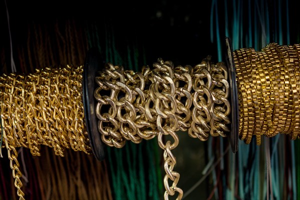 Rolls of metal chains as a background texture