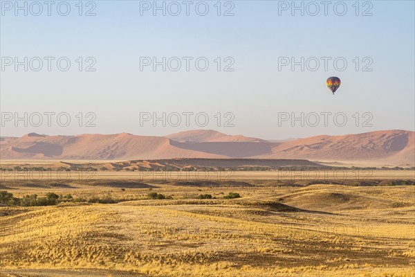 Hot air balloon over dune landscape of Sossusvlei