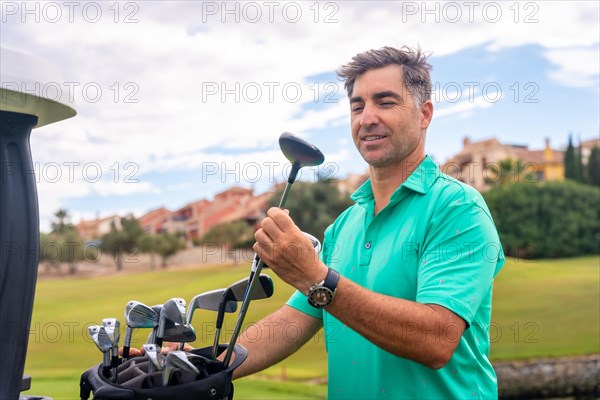 Man playing golf at golf club