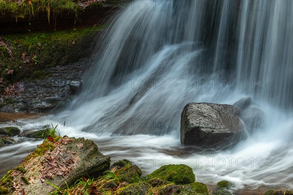 Fresh water waterfall on rocks moss cover in mountain. Fresh water waterfall on rocks moss cover in mountain.osges Alsace