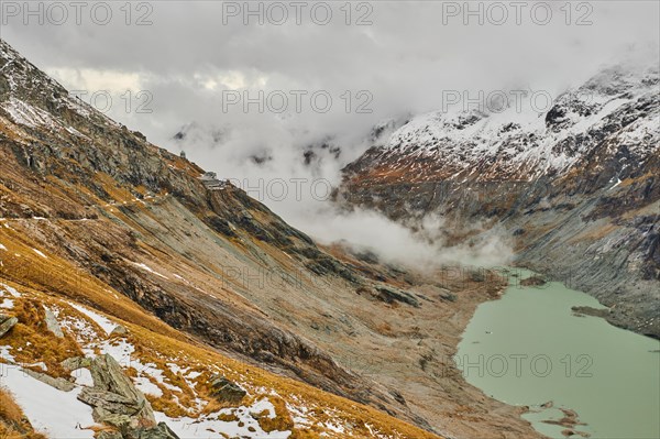 Clouds lying in the valley at Pasterze Hochalpengletscher