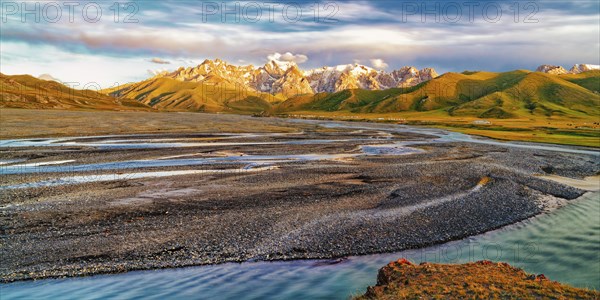 Sunset over the Central Tien Shan Mountains and glacier river