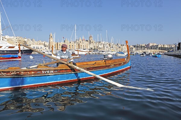 Traditional boat or dghajsa in Grand Harbour