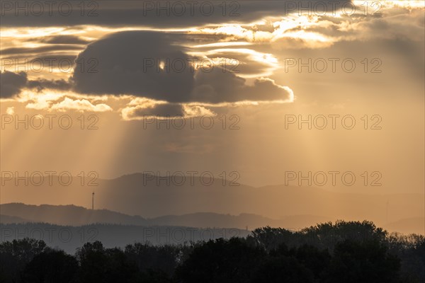 Wind turbines on the mountains of the Black Forest at dawn. Freiburg brisgau