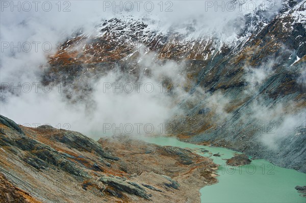 Clouds lying in the valley at Pasterze Hochalpengletscher