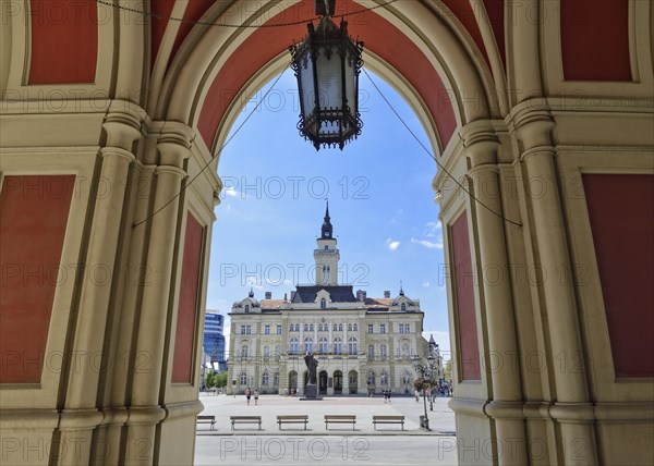 City Hall viewed from below the arches of the Name of Mary Church