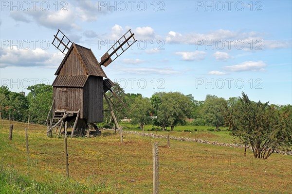 A windmill in a meadow