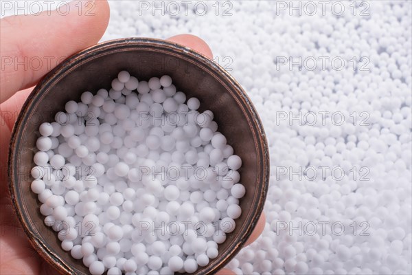 White little polystyrene foam balls as background