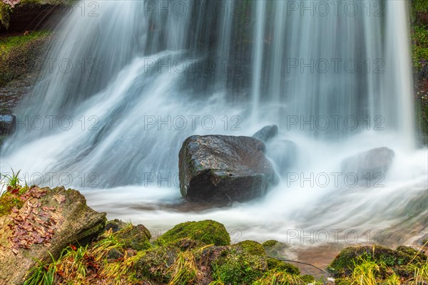 Fresh water waterfall on rocks moss cover in mountain. Fresh water waterfall on rocks moss cover in mountain.osges Alsace