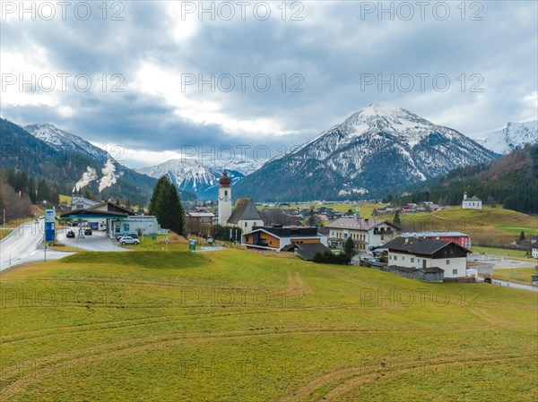 Village in front of mountain landscape