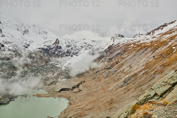 Clouds lying in the valley at Pasterze Hochalpengletscher