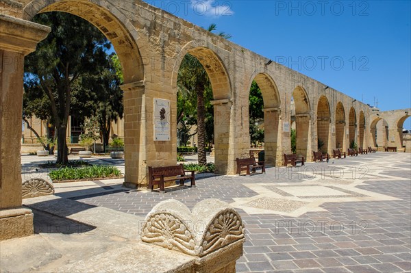 Arcades in Upper Barraka Gardens between garden and platform above parade ground