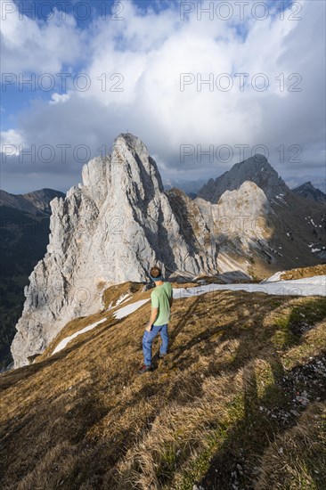 Hiker at the summit of Rote Flueh