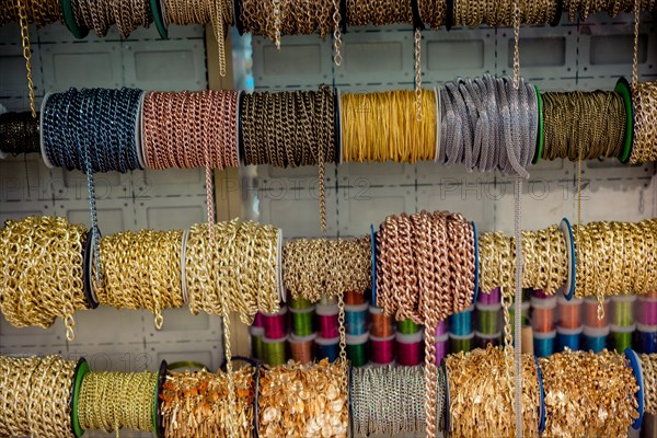 Rolls of metal chains as a background texture