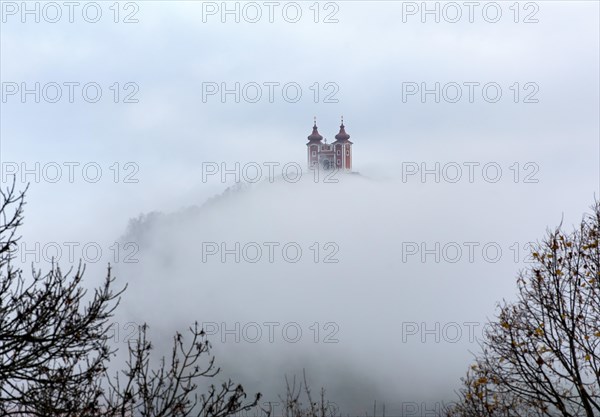 Calvary over clouds of fog