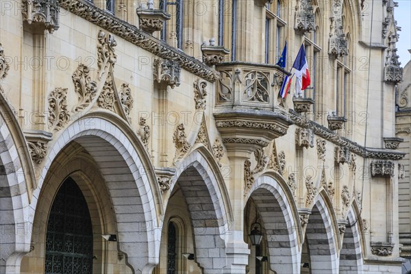 Gothic Town Hall facade on the Place des Heros