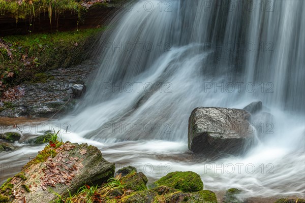 Fresh water waterfall on rocks moss cover in mountain. Fresh water waterfall on rocks moss cover in mountain.osges Alsace