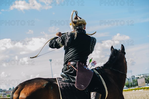 Ottoman archer riding and shooting on horseback