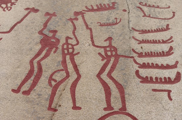Rock carvings with figures